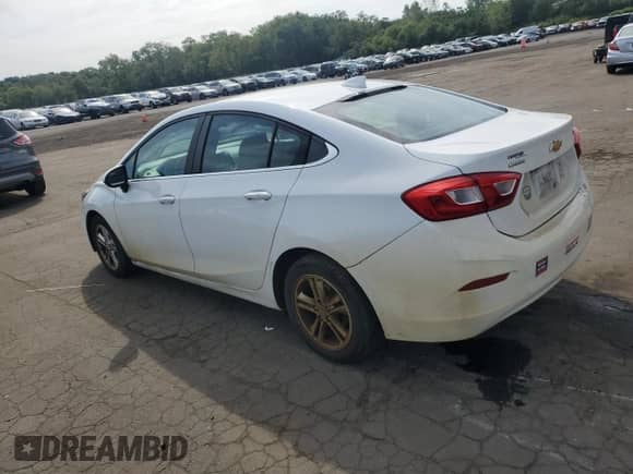 2017 Chevrolet Cruze LT z VIN 1G1BE5SM2H7158861, wystawiony jako Copart lot #70296445 z przebiegiem 116 187 mil mil oraz Szkoda całkowita • Salvage title. Historia ofert i sprzedaży dostępna na DreamBid. Obrazek 2.