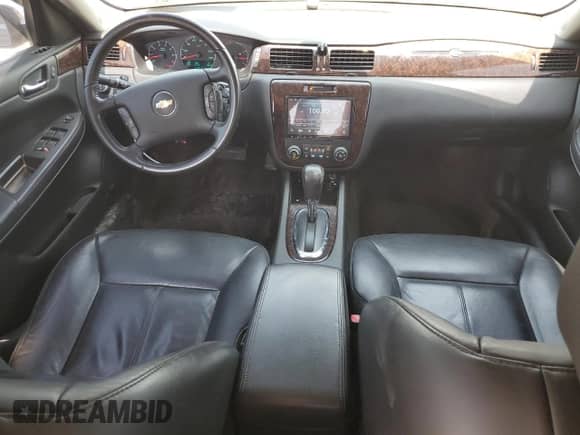 2012 Chevrolet Impala LTZ z VIN 2G1WC5E32C1213194, wystawiony jako Copart lot #67763315 z przebiegiem 106 856 mil mil oraz Szkoda całkowita • Salvage title. Historia ofert i sprzedaży dostępna na DreamBid. Obrazek 8.