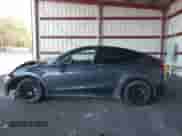2022 Tesla Model Y Long Range z VIN 7SAYGDEE9NA010903, wystawiony jako IAAI lot #43397965 z przebiegiem 20 830 mil mil oraz . Historia ofert i sprzedaży dostępna na DreamBid. Obrazek 14.
