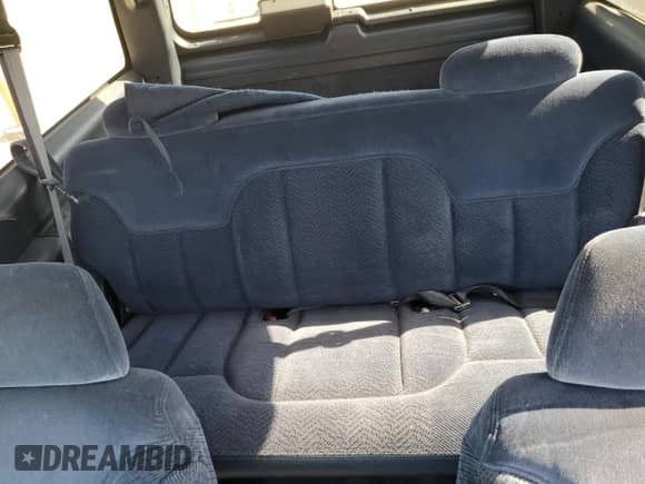 1998 Chevrolet Tahoe с VIN 3GNEK18R5WG107730, выставлен на аукционе Copart как лот 74563524 с пробегом 251 307 миль миль и Списание • Salvage title. История ставок и продаж доступна на DreamBid. Изображение 10.