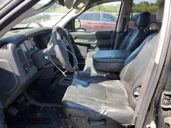 2004 Dodge 1500 SLT with VIN 1D7HU18D14S502018, listed as a Copart auction lot 72074895 with 143,545 mi miles and Salvage title. Bid and sale history available at DreamBid. Image 7.