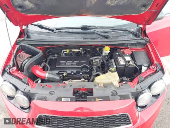 2013 Chevrolet Sonic RS z VIN 1G1JH6SB5D4158355, wystawiony jako IAAI lot #42234638 z przebiegiem 164 870 mil mil oraz . Historia ofert i sprzedaży dostępna na DreamBid. Obrazek 10.