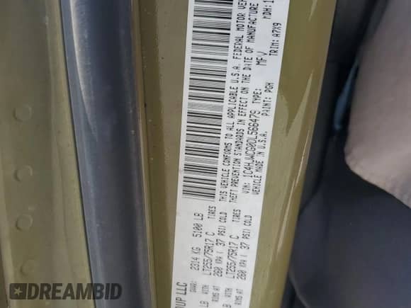 2013 Jeep Wrangler Rubicon with VIN 1C4HJWCG0DL566479, listed as a Copart auction lot 69092745 with 103,839 mi miles and Salvage title. Bid and sale history available at DreamBid. Image 13.