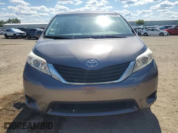 2014 Toyota Sienna LE AAS with VIN 5TDKK3DCXES518761, listed as a Copart auction lot 70665485 with 192,656 mi miles and Salvage title. Bid and sale history available at DreamBid. Image 5.