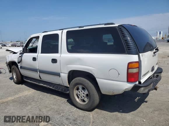 2003 Chevrolet Suburban LT z VIN 3GNEC16Z63G112415, wystawiony jako Copart lot #64271614 z przebiegiem 348 302 mil mil oraz Szkoda całkowita • Salvage title. Historia ofert i sprzedaży dostępna na DreamBid. Obrazek 2.