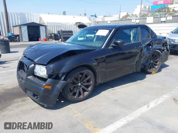 2006 Chrysler 300 C SRT-8 with VIN 2C3LA73W86H518966, listed as a IAAI auction lot 42725107 with 175,474 mi miles and . Bid and sale history available at DreamBid. Image 18.