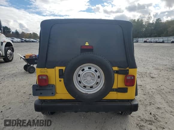 2001 Jeep Wrangler SE with VIN 1J4FA29P61P350948, listed as a Copart auction lot 90279745 with 105,585 mi miles and Clean title. Bid and sale history available at DreamBid. Image 6.