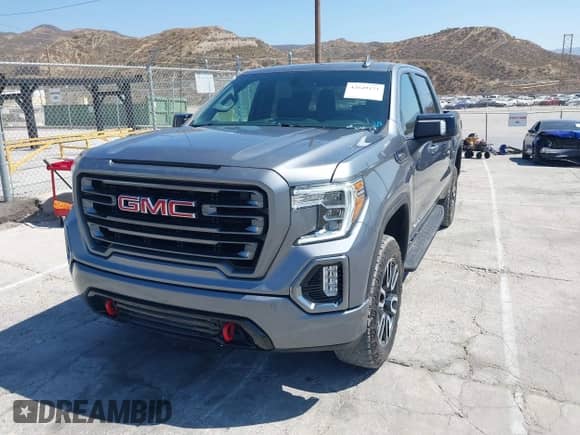 2021 GMC Sierra 1500 AT4 z VIN 3GTP9EED2MG432376, wystawiony jako IAAI lot #42649171 z przebiegiem 16 090 mil mil oraz . Historia ofert i sprzedaży dostępna na DreamBid. Obrazek 2.