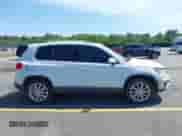 2015 Volkswagen Tiguan S with VIN WVGAV7AX4FW506314, listed as a IAAI auction lot 42063584 with 143,939 mi miles and . Bid and sale history available at DreamBid. Image 14.