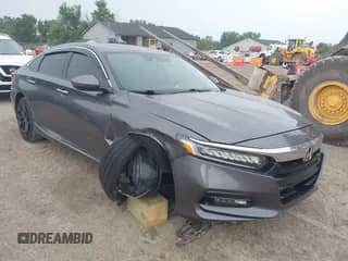 2019 Honda Accord Touring with VIN 1HGCV2F94KA016166, listed as a IAAI auction lot 42754764 with 107,921 mi miles and . Bid and sale history available at DreamBid. Image 1.