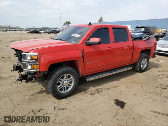 2015 Chevrolet Silverado 1500 LT with VIN 3GCUKREH2FG216466, listed as a Copart auction lot 53704635 with 106,148 mi miles and Salvage title. Bid and sale history available at DreamBid. Image 1.