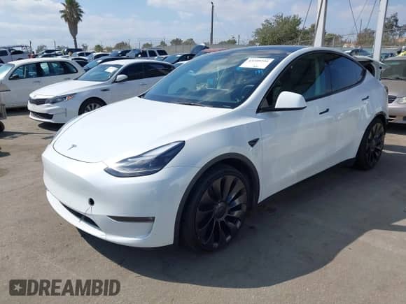 2023 Tesla Model Y Performance with VIN 7SAYGDEF6PF807723, listed as a IAAI auction lot 43209294 with 48,943 mi miles and . Bid and sale history available at DreamBid. Image 2.