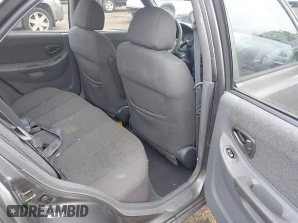 2002 Hyundai Accent GL z VIN KMHCG45C52U372587, wystawiony jako IAAI lot #42244428 z przebiegiem 43 538 mil mil oraz . Historia ofert i sprzedaży dostępna na DreamBid. Obrazek 8.