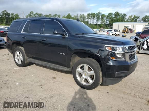 2017 Chevrolet Tahoe LT with VIN 1GNSCBKC7HR202206, listed as a Copart auction lot 65991825 with 246,979 mi miles and Salvage title. Bid and sale history available at DreamBid. Image 4.
