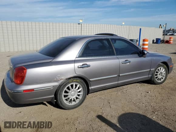 2005 Hyundai XG с VIN KMHFU45E05A425533, выставлен на аукционе Copart как лот 59055494 с пробегом 157 456 миль миль и Списание • Salvage title. История ставок и продаж доступна на DreamBid. Изображение 3.