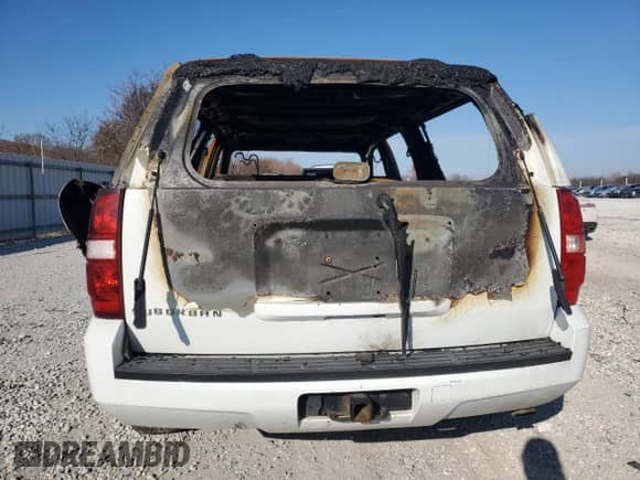 2011 Chevrolet Suburban with VIN 1GNWK5EG5BR230131, listed as a Copart auction lot 82959184 with Not provided miles and Salvage title. Bid and sale history available at DreamBid. Image 6.