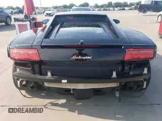 2014 Lamborghini Gallardo с VIN ZHWGU5BZ6ELA13766, выставлен на аукционе Copart как лот 64172354 с пробегом 22 043 миль миль и Списание • Salvage title. История ставок и продаж доступна на DreamBid. Изображение 6.