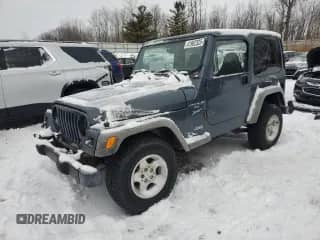 2001 Jeep Wrangler Sport z VIN 1J4FA49S81P334783, wystawiony jako Copart lot #63590275 z przebiegiem 209 738 mil mil oraz Nie do naprawy • Non repairable. Historia ofert i sprzedaży dostępna na DreamBid. Obrazek 1.