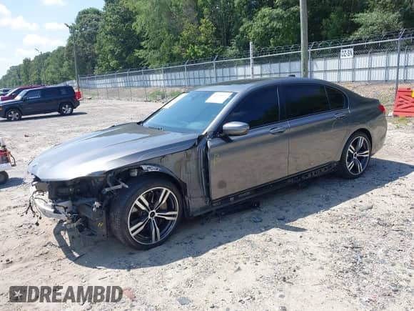 2017 BMW 7 Series ALPINA B7 xDrive with VIN WBA7F2C57HG421911, listed as a IAAI auction lot 42798037 with 124,549 mi miles and . Bid and sale history available at DreamBid. Image 18.