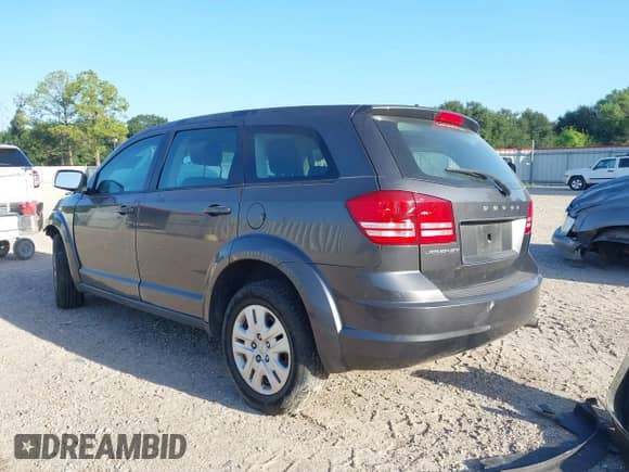 2015 Dodge Journey American Value z VIN 3C4PDCAB5FT559219, wystawiony jako IAAI lot #42852010 z przebiegiem 58 773 mil mil oraz . Historia ofert i sprzedaży dostępna na DreamBid. Obrazek 3.