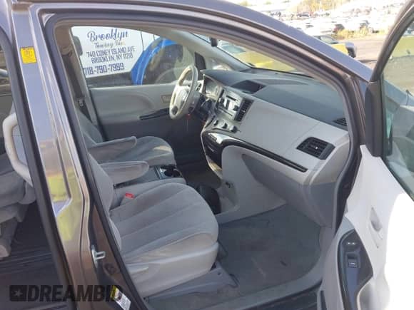 2012 Toyota Sienna LE AAS with VIN 5TDKK3DC2CS215910, listed as a IAAI auction lot 43063000 with 169,580 mi miles and . Bid and sale history available at DreamBid. Image 5.