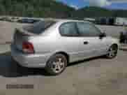 2002 Hyundai Accent GS с VIN KMHCG35C62U170660, выставлен на аукционе Copart как лот 49396344 с пробегом 145 942 миль миль и Списание • Salvage title. История ставок и продаж доступна на DreamBid. Изображение 3.