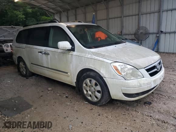 2007 Hyundai Entourage GLS with VIN KNDMC233776034423, listed as a Copart auction lot 61694055 with Not provided miles and Clean title. Bid and sale history available at DreamBid. Image 4.