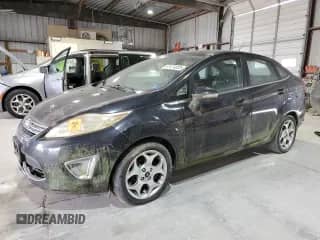 2011 Ford Fiesta SEL with VIN 3FADP4CJ0BM207325, listed as a Copart auction lot 67474035 with Not provided miles and Clean title. Bid and sale history available at DreamBid. Image 1.