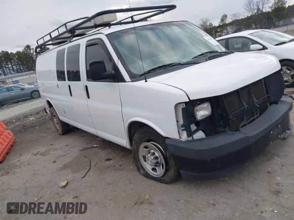2017 Chevrolet Express Cargo with VIN 1GCWGBFG4H1348685, listed as a IAAI auction lot 41234959 with 215,067 mi miles and . Bid and sale history available at DreamBid. Image 1.