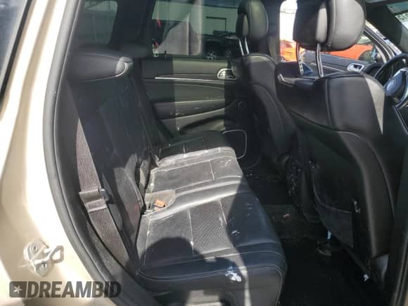 2014 Jeep Grand Cherokee Summit z VIN 1C4RJFJG9EC201114, wystawiony jako Copart lot #84837615 z przebiegiem 182 063 mil mil oraz Czysty tytuł • Clean title. Historia ofert i sprzedaży dostępna na DreamBid. Obrazek 11.