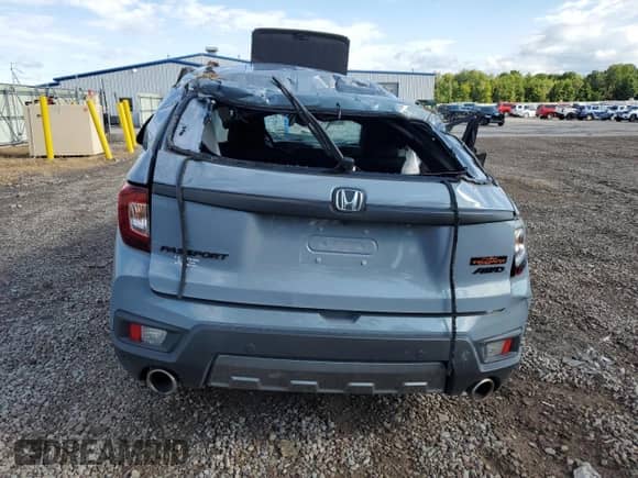 2022 Honda Passport TrailSport с VIN 5FNYF8H65NB002182, выставлен на аукционе Copart как лот 70024075 с пробегом Не указан миль и Списание • Salvage title. История ставок и продаж доступна на DreamBid. Изображение 6.