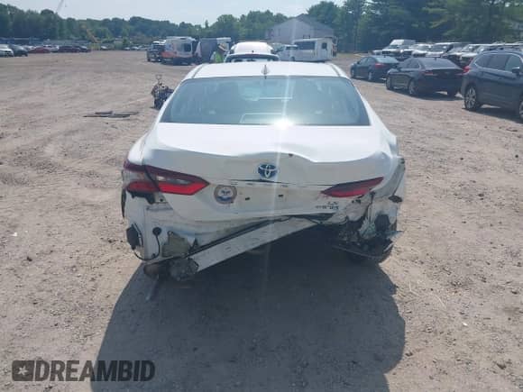 2022 Toyota Camry Hybrid LE with VIN 4T1C31AK2NU591549, listed as a IAAI auction lot 42499072 with 55,882 mi miles and . Bid and sale history available at DreamBid. Image 16.