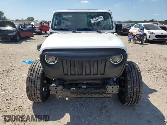 2023 Jeep Wrangler Sahara with VIN 1C4JJXP69PW555542, listed as a Copart auction lot 70154975 with 38,720 mi miles and Salvage title. Bid and sale history available at DreamBid. Image 5.