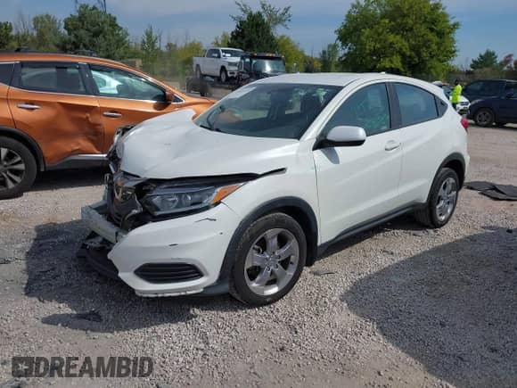 2020 Honda HR-V LX z VIN 3CZRU6H35LM737882, wystawiony jako IAAI lot #43215771 z przebiegiem 141 657 mil mil oraz . Historia ofert i sprzedaży dostępna na DreamBid. Obrazek 2.