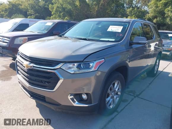 2018 Chevrolet Traverse LT Cloth z VIN 1GNERGKW3JJ209693, wystawiony jako IAAI lot #43443294 z przebiegiem 105 300 mil mil oraz . Historia ofert i sprzedaży dostępna na DreamBid. Obrazek 17.