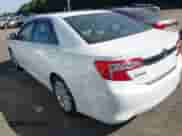 2014 Toyota Camry LE z VIN 4T1BD1FK9EU126185, wystawiony jako IAAI lot #43091293 z przebiegiem 294 754 mil mil oraz . Historia ofert i sprzedaży dostępna na DreamBid. Obrazek 3.