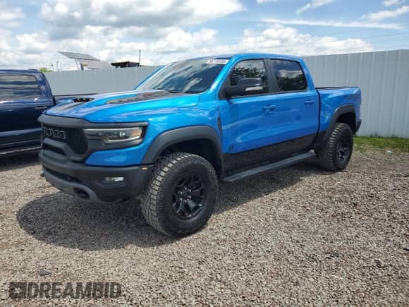 2022 Ram 1500 TRX с VIN 1C6SRFU93NN229879, выставлен на аукционе Copart как лот 58710335 с пробегом 8 047 миль миль и Списание • Salvage title. История ставок и продаж доступна на DreamBid. Изображение 1.