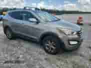 2015 Hyundai Santa Fe z VIN 5XYZUDLB1FG294690, wystawiony jako Copart lot #65039015 z przebiegiem 144 835 mil mil oraz Szkoda całkowita • Salvage title. Historia ofert i sprzedaży dostępna na DreamBid. Obrazek 4.