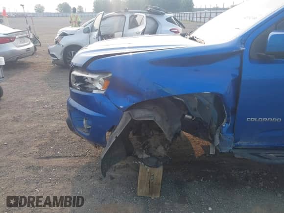 2018 Chevrolet Colorado 4WD Z71 with VIN 1GCGTDEN3J1327148, listed as a IAAI auction lot 42392306 with 70,932 mi miles and . Bid and sale history available at DreamBid. Image 18.