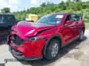 2023 Mazda CX-5 S Carbon Edition z VIN JM3KFBCM5P0134148, wystawiony jako IAAI lot #42455010 z przebiegiem 57 414 mil mil oraz . Historia ofert i sprzedaży dostępna na DreamBid. Obrazek 2.