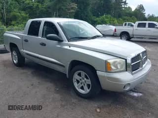 2007 Dodge Dakota SLT with VIN 1D7HE48K27S127788, listed as a IAAI auction lot 42311626 with 357,130 mi miles and . Bid and sale history available at DreamBid. Image 1.