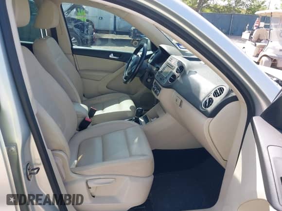 2011 Volkswagen Tiguan S with VIN WVGBV7AX9BW524886, listed as a IAAI auction lot 41828847 with 199,813 mi miles and . Bid and sale history available at DreamBid. Image 5.