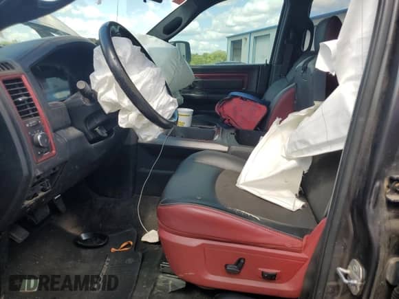 2018 Ram 1500 Rebel z VIN 1C6RR7YT0JS145136, wystawiony jako Copart lot #73692774 z przebiegiem 135 583 mil mil oraz Czysty tytuł • Clean title. Historia ofert i sprzedaży dostępna na DreamBid. Obrazek 7.