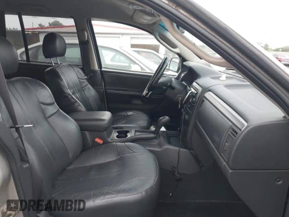 2002 Jeep Grand Cherokee Sport with VIN 1J4GW38S62C156866, listed as a IAAI auction lot 42879186 with 194,324 mi miles and . Bid and sale history available at DreamBid. Image 5.