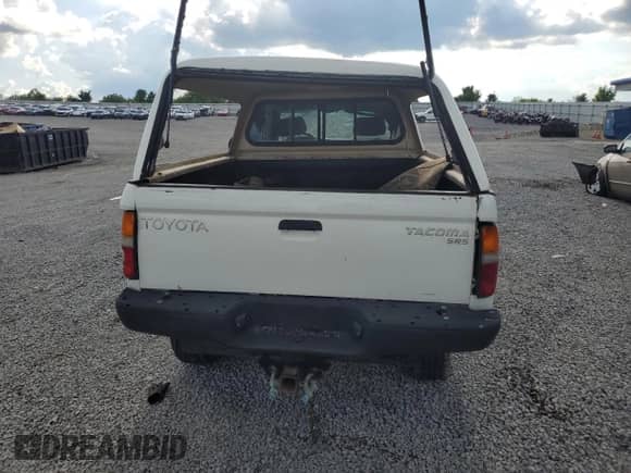 1997 Toyota Tacoma z VIN 4TAWN72N9VZ220491, wystawiony jako Copart lot #56366725 z przebiegiem 323 755 mil mil oraz Szkoda całkowita • Salvage title. Historia ofert i sprzedaży dostępna na DreamBid. Obrazek 6.