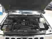 1996 Jeep Grand Cherokee Laredo z VIN 1J4GZ58S5TC293897, wystawiony jako IAAI lot #42435233 z przebiegiem 167 432 mil mil oraz . Historia ofert i sprzedaży dostępna na DreamBid. Obrazek 10.