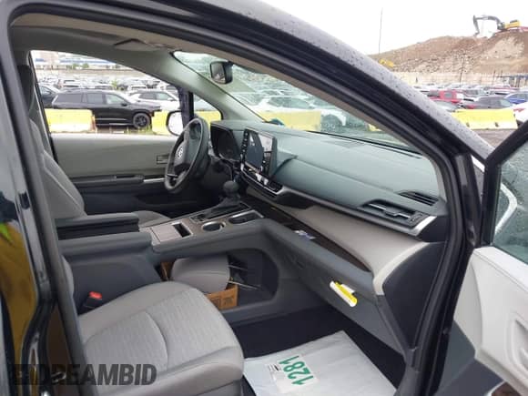 2024 Toyota Sienna LE with VIN 5TDBSKFC2RS142957, listed as a IAAI auction lot 42382592 with 7,407 mi miles and . Bid and sale history available at DreamBid. Image 5.