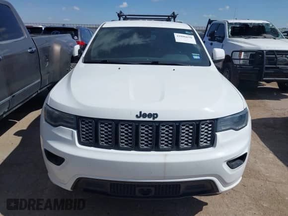 2021 Jeep Grand Cherokee Laredo X with VIN 1C4RJFAGXMC809948, listed as a IAAI auction lot 42806650 with 71,623 mi miles and . Bid and sale history available at DreamBid. Image 12.