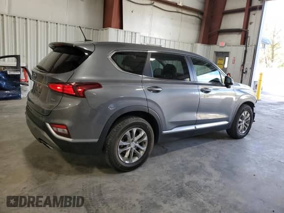 2019 Hyundai Santa Fe SE with VIN 5NMS2CAD7KH095410, listed as a Copart auction lot 86133115 with 98,866 mi miles and Salvage title. Bid and sale history available at DreamBid. Image 3.