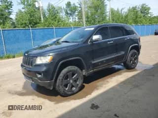 2011 Jeep Grand Cherokee Limited z VIN 1J4RR5GT2BC527186, wystawiony jako Copart lot #61129875 z przebiegiem 295 420 mil mil oraz Czysty tytuł • Clean title. Historia ofert i sprzedaży dostępna na DreamBid. Obrazek 1.